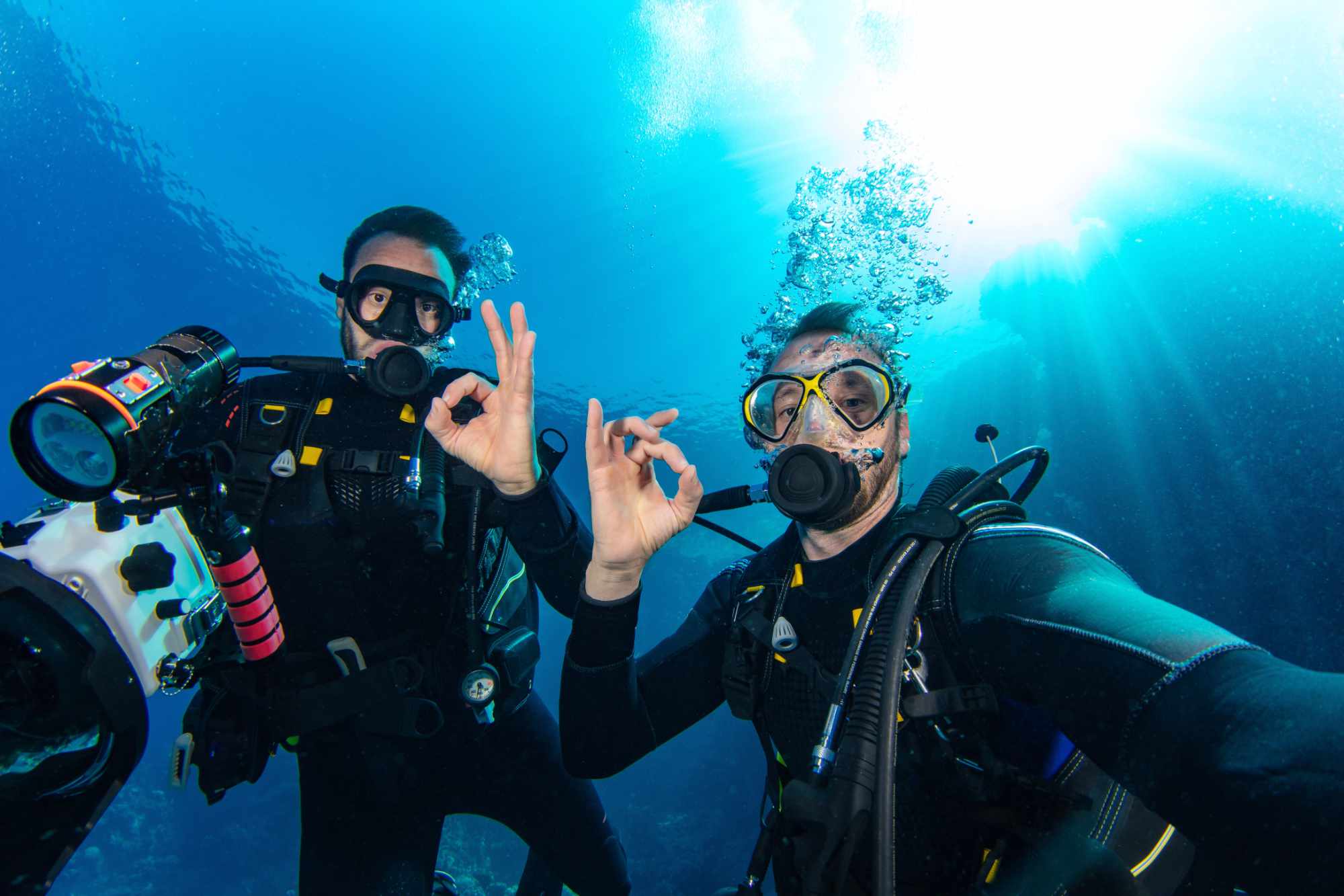 Divers giving the OK sign